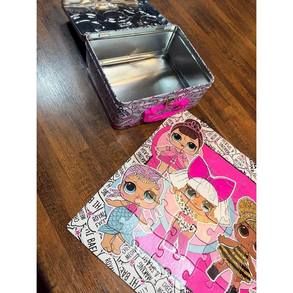 LOL Surprise lunch tin box with 48 piece puzzle inside.